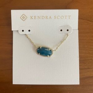 Kendra Scott Elisa necklace in gold with a turquoise stone.